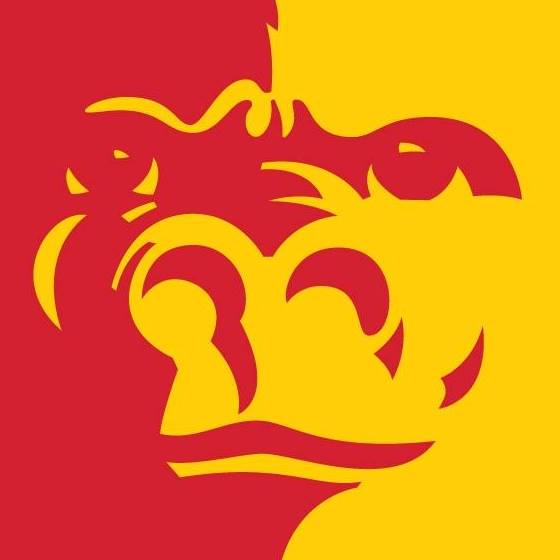 Overhead drone photo of a school bus navigating an intersection